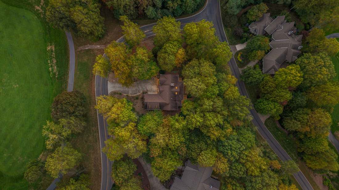 Overhead, the corner lot beside the fairway