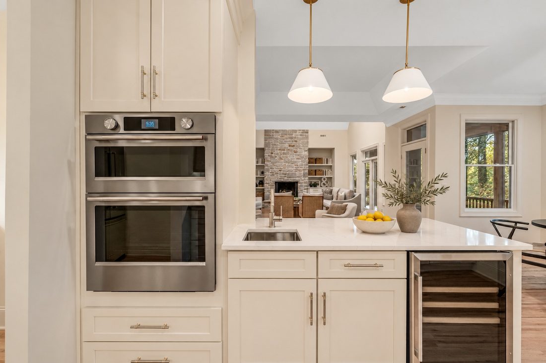Wall ovens and beverage refrigerator (virtually staged)