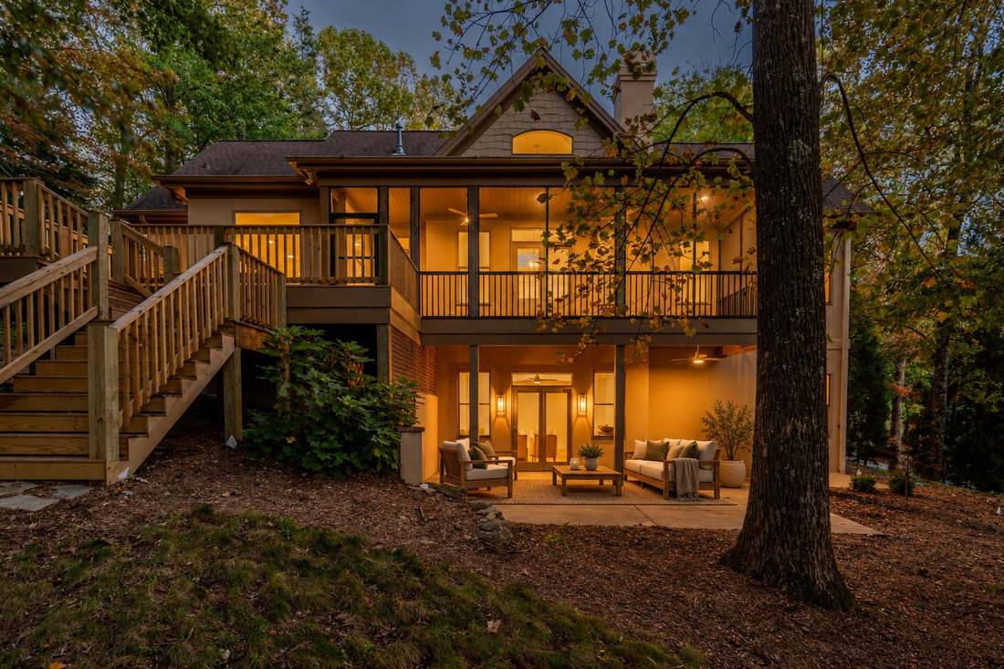 Rear elevation at twilight (virtually staged)